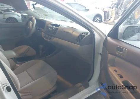 2003 Toyota Camry Le z USA, uszkodzony, nr VIN 4T1BE32KX3U146831